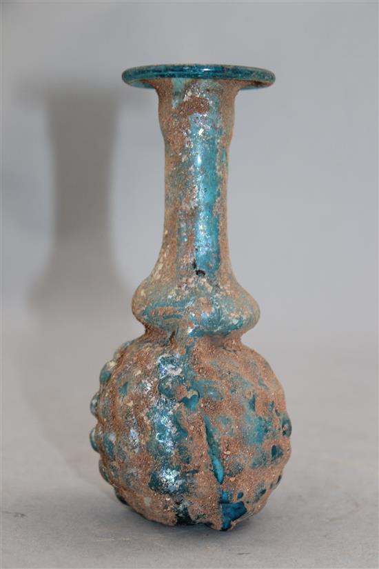 A Roman turquoise glass grape flask, Syria 1st / 2nd century AD, 13.5cm